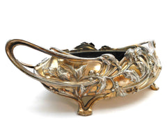 Oval Bronze Silverplated  Jardinière Art Nouveau, decorated with boughs of holly, ending in winding loops. Circa 1900 by Victor Saglier & Frères, Silversmiths Paris. Hallmarked.