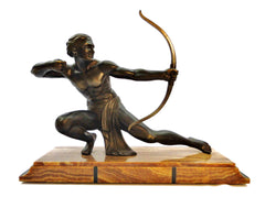 Large Male Archer Sculpture mounted on a marble base measuring 60 cm  23.62" long. Spelter with a beautiful bronze patina. Signed SALVATORE MELANI  1920-1930's.