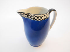 Blue Pitcher with Black & White Checkered pattern