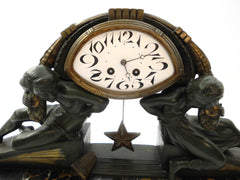 Impressive Clock in green patinated Spelter on a Portoro Marble Base. Designed by the famous Belgian Sculptor Georges Van de Voorde. This Masterpiece named "L'Etoile" (Star) was presented at the select "Salon des Artistes Français" in Paris around 1920.