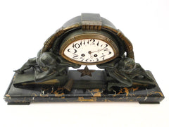 Impressive Clock in green patinated Spelter on a Portoro Marble Base. Designed by the famous Belgian Sculptor Georges Van de Voorde. This Masterpiece named "L'Etoile" (Star) was presented at the select "Salon des Artistes Français" in Paris around 1920.